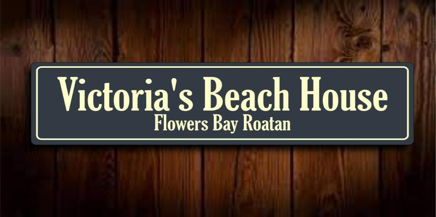 Victoria S Beach House And Snorkeling Center Flowers Bay Exterior photo